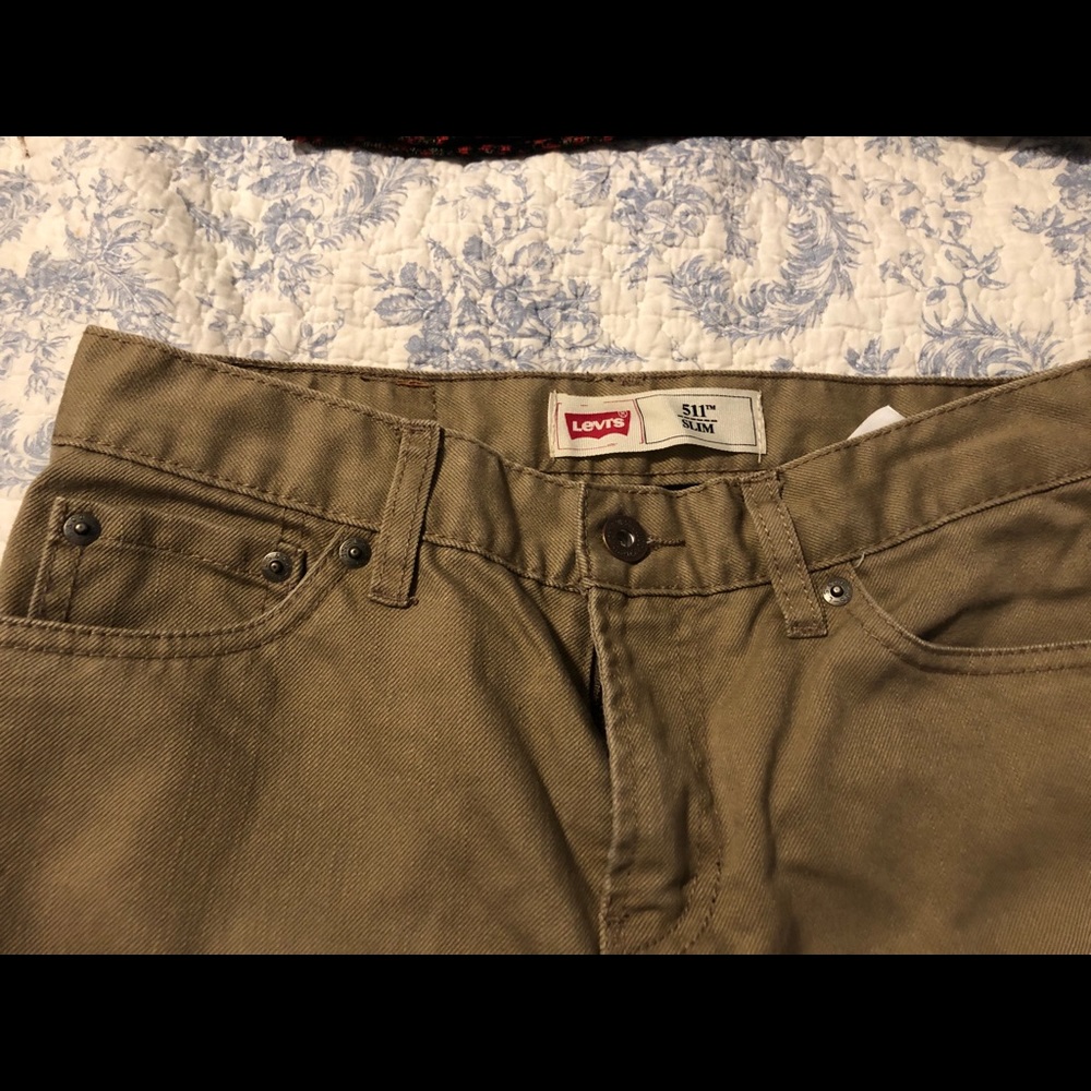 Tan jeans worn once .
